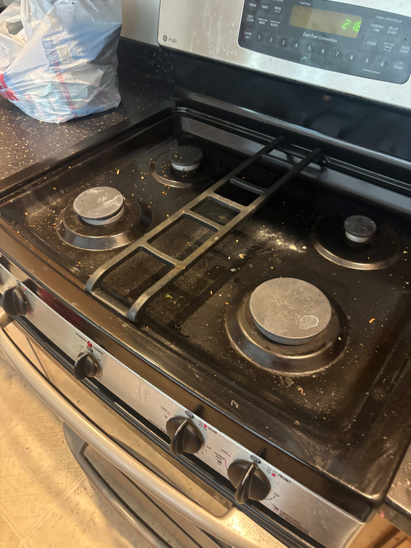 Stovetop before cleaning by Haylo Upscale Solutions